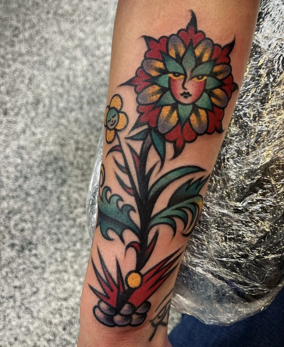 Traditional flower tattoo by Adventure Tattoo